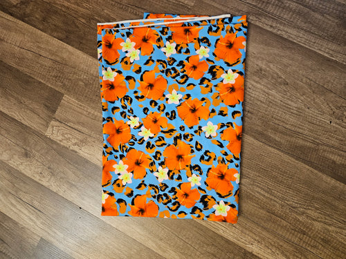 1 yard Leopard Print Orange Hibiscus Nylon Spandex Fabric | Blue Moon Fabrics